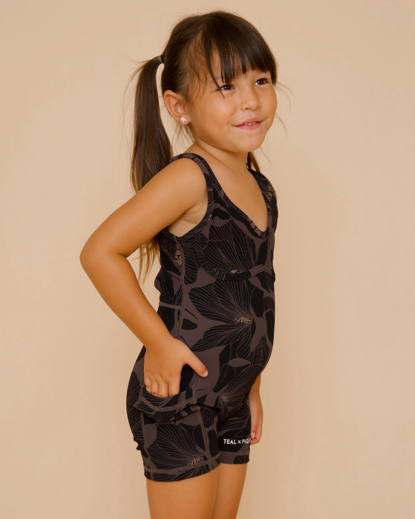 Mini Aura Jumpsuit in Magnolia - Charcoal