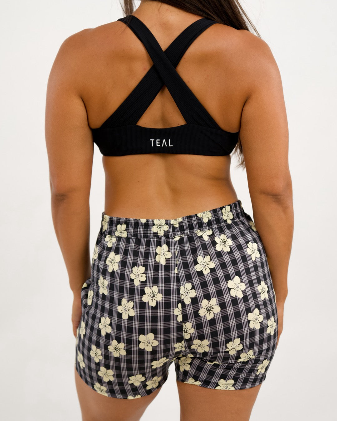Hybrid Women’s Short in Black Puakenikeni *WRONG SIZE LABEL*