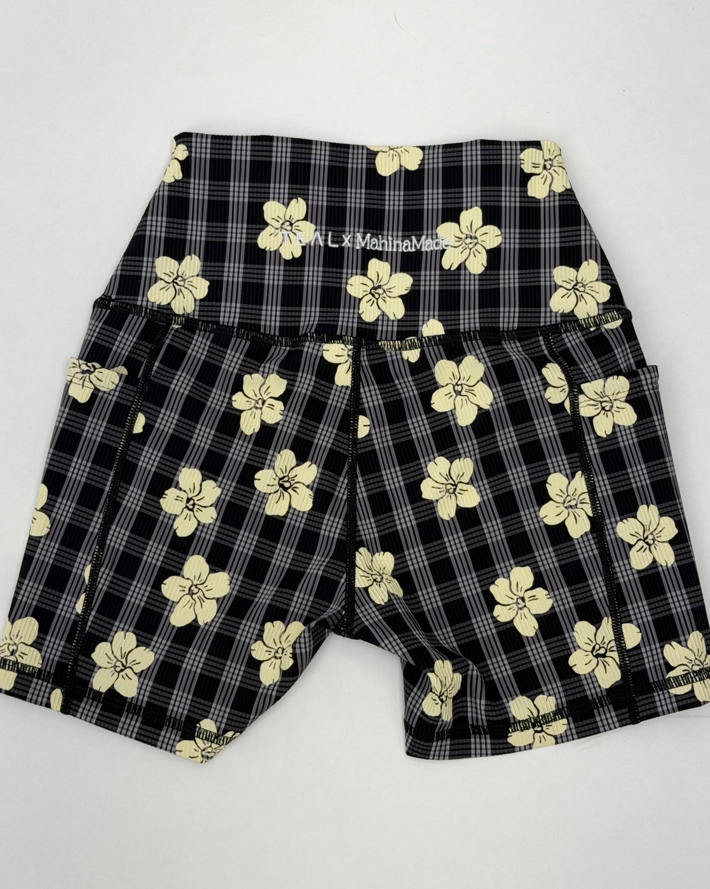 Essential 4" Biker Short in Black Puakenikeni