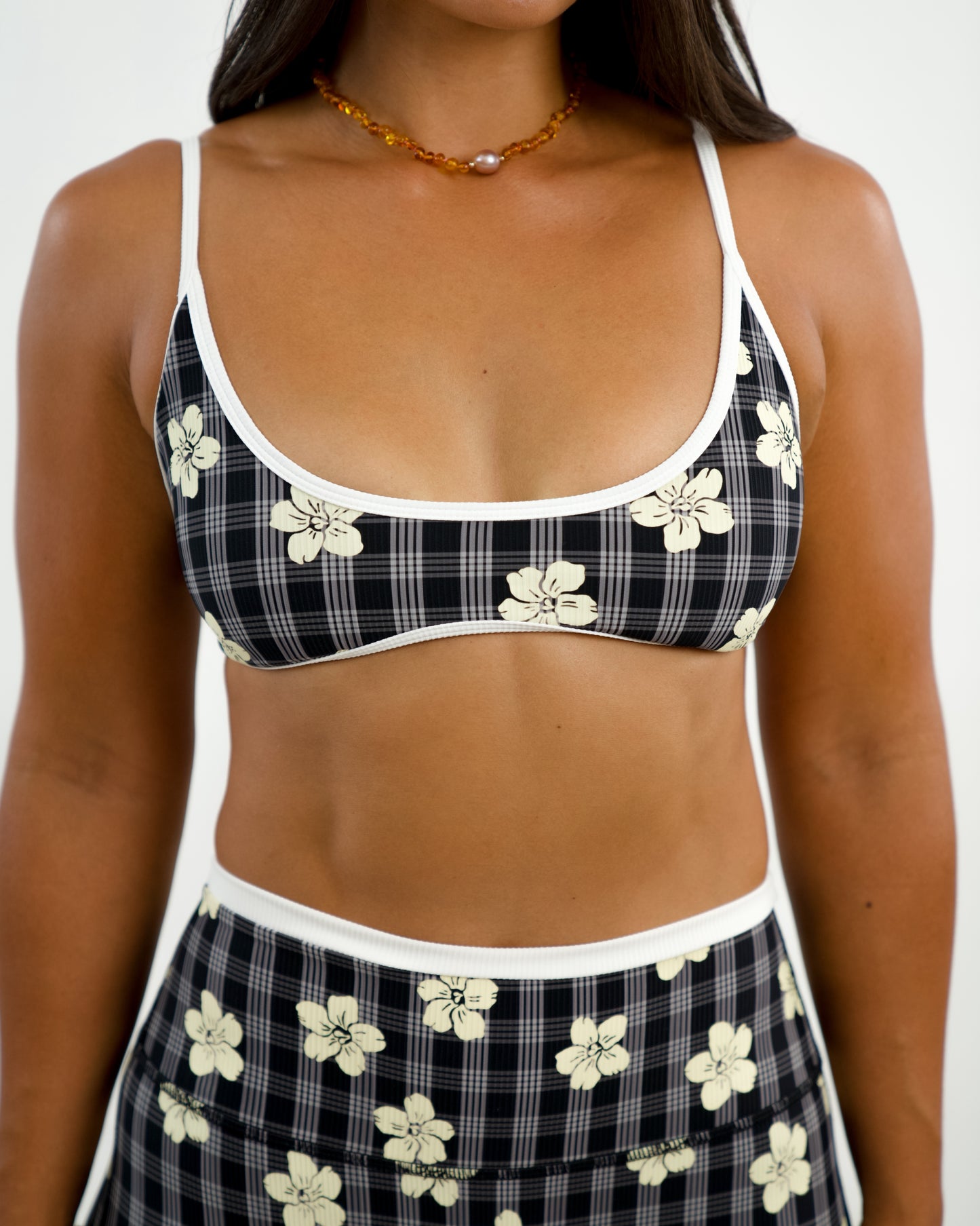 Liv Micro Top in Black Puakenikeni