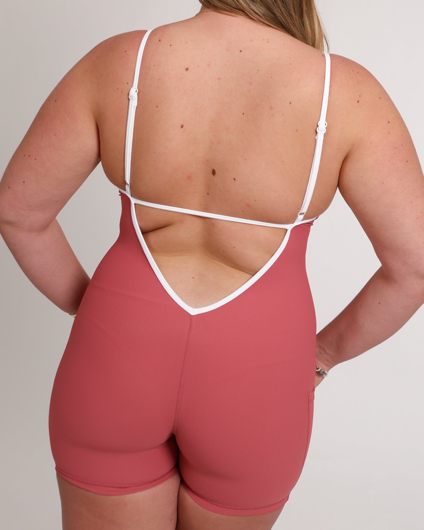 Azure V-Back Jumpsuit in Ribbed Coral Pink