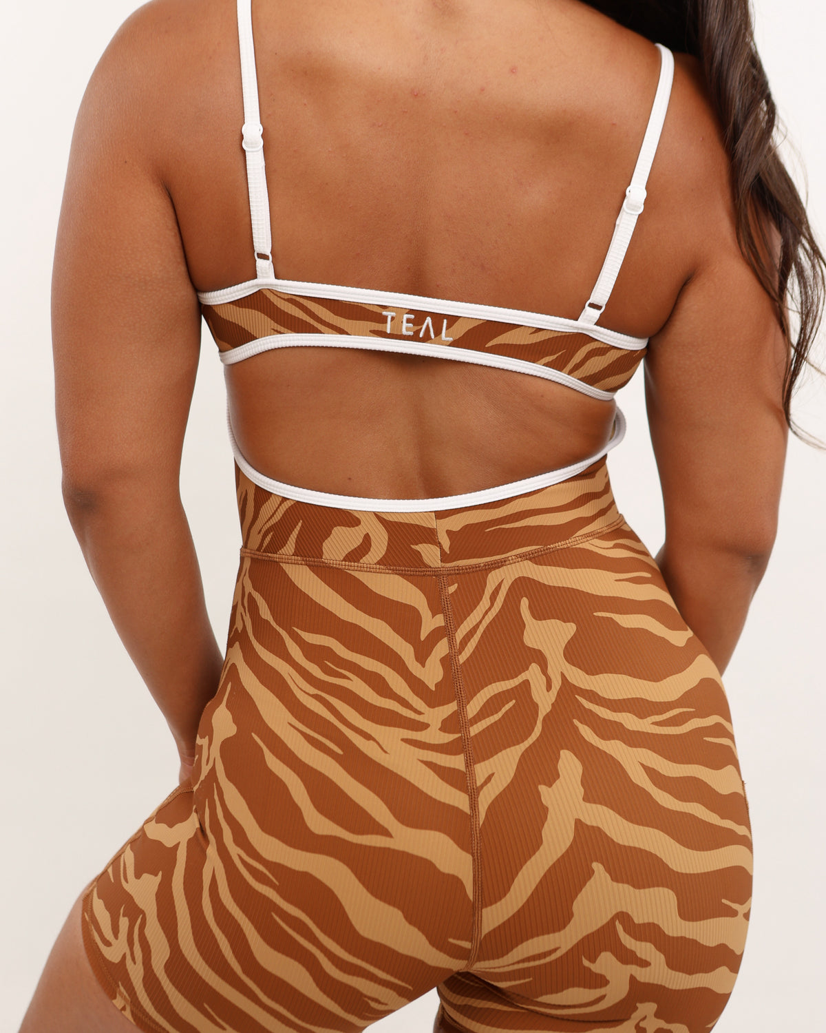 Kayla Jumpsuit in Caramel Zebra w/ Trim
